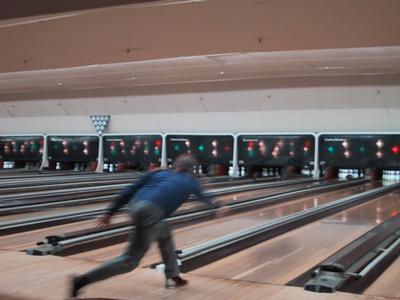 [Dan bowling]