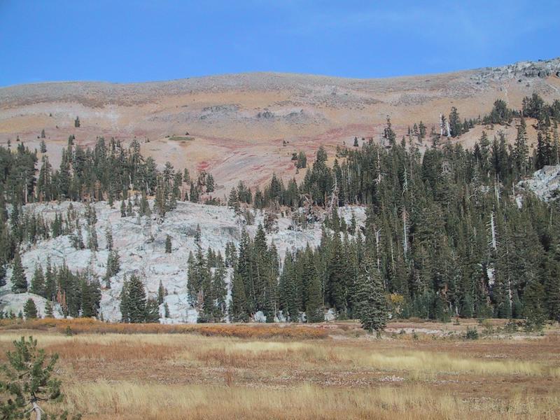 [Red and gold hills]