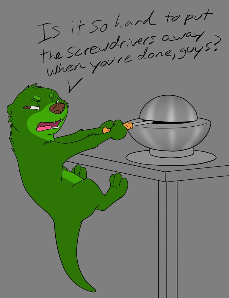 A green cartoon ferret braced against a table edge trying to 
pull a screwdriver out of an assembly that references the 'Demon Core'  
plutoniumgallium 
alloy casting that was involved in two criticality incidents with resulting fatalities. The 
caption reads 'is it so hard to put the screwdrivers away when you're done, guys?'