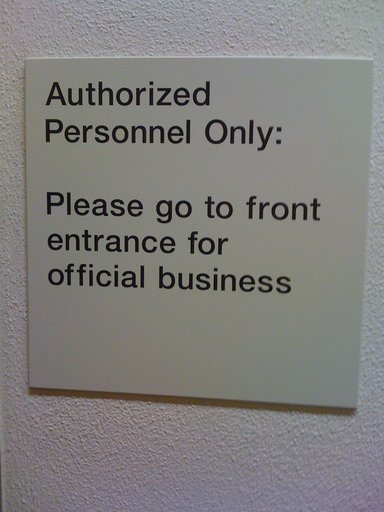 [Please go to front entrance for official business]